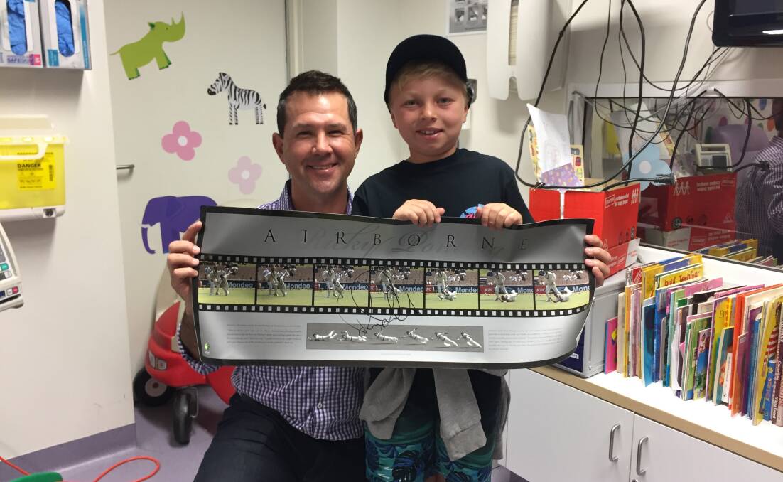 CRICKET FAN: Tasmanian cricketer Ricky Ponting and fan Rex Johnson, 9, ahead of the Biggest Game of Cricket charity match in Launceston. Picture: Michelle Wisbey
