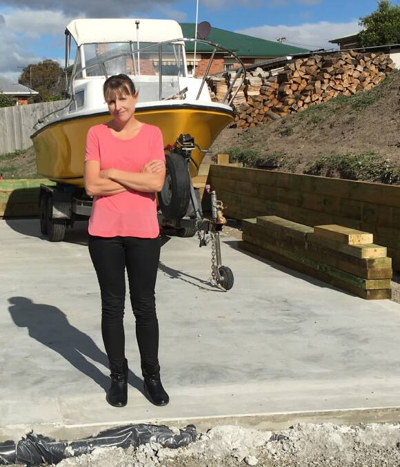 FRUSTRATED: Kathryn Allen, of Youngtown, has been left with an empty slab of concrete in her backyard after the $6000 VIP Shed she ordered and paid for was never delivered.