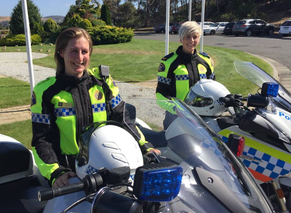 RIDING STRONG: Tasmania Police Constable Kristy Eyles and Senior Constable Desi Amerikanos are the state's two female fully-qualified operational motorcyclists. 