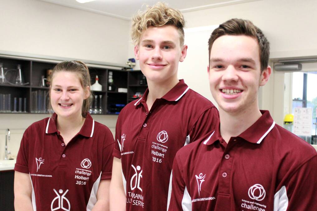 CHALLENGE: Launceston Christian School students Charlotte Salter, Jack Sladden and Callum Watson, all 16, prepare to compete in the national final of the Science and Engineering Challenge in Hobart. Picture: Peter Cox 