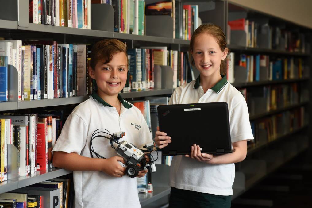 POP-UP CLASSROOM: East Launceston Primary School pupils Sam Huett and Amelia Reynolds spend the day learning at the Launceston LINC. Picture: Scott Gelston 