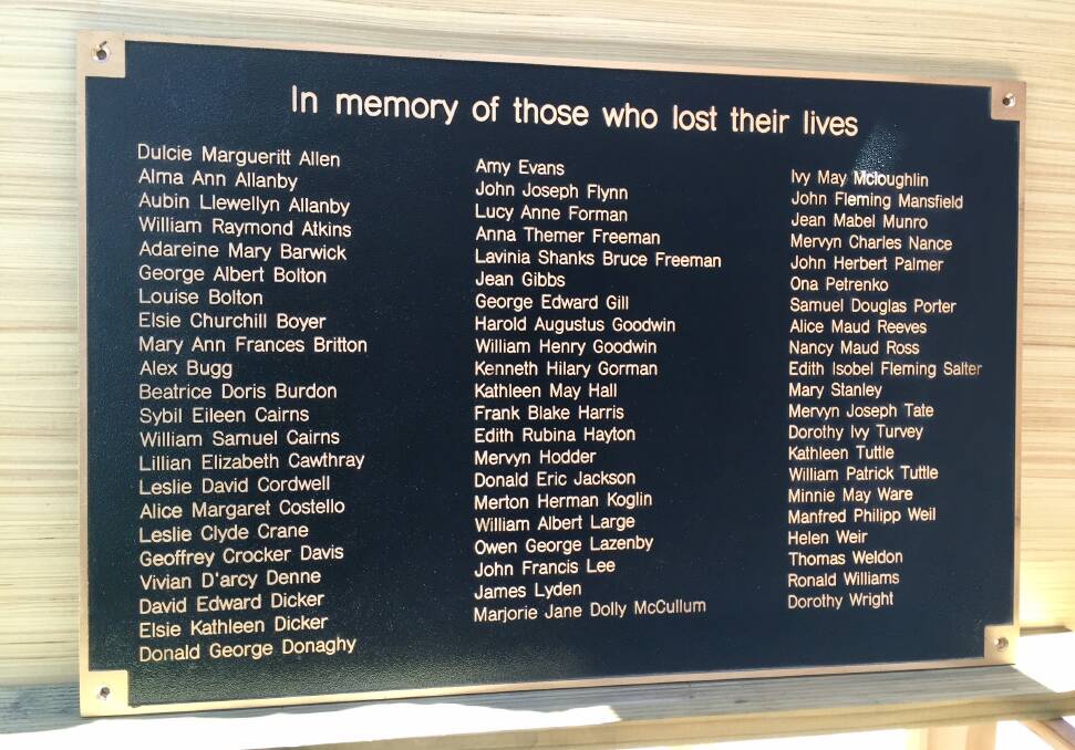 REMEMBERING: A new plaque at Snug remembering the 64 people who lost their lives. 