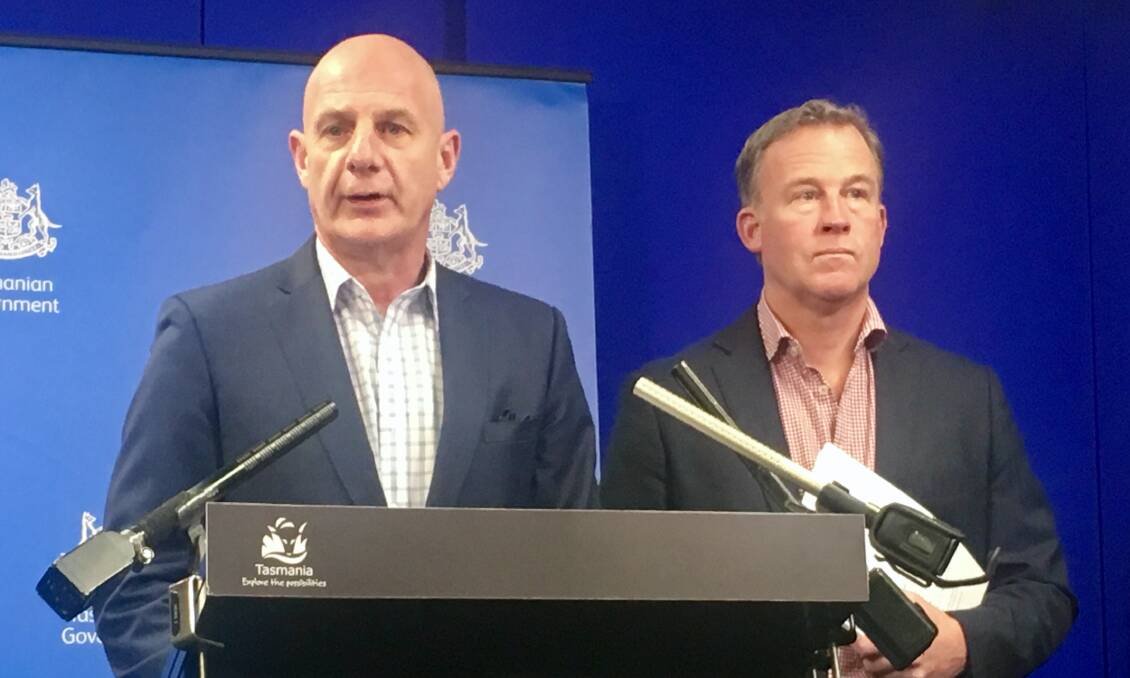 TAKEOVER: Treasurer Peter Gutwein and Premier Will Hodgman reveal a draft bill for the TasWater takeover. 