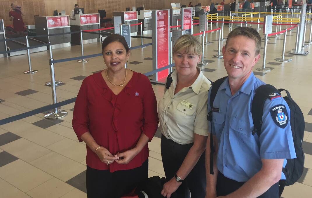 HELPING HAND: Maree Hinton, Adele Wright and Andrew McConnon prepare to fly to Queensland to help clean up after Cyclone Debbie. Picture: Michelle Wisbey