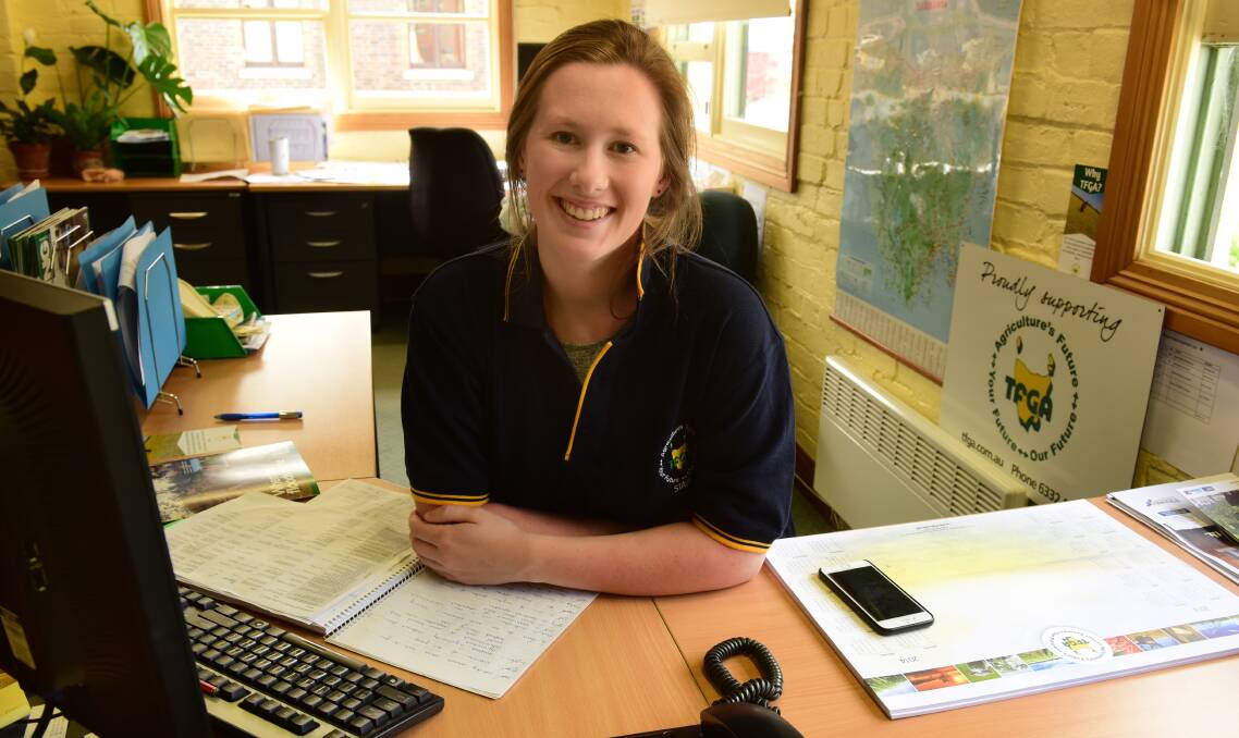 WORKING: Agricultural science graduate Elle Davis is now working at the Tasmanian Farmers and Graziers Association, helping farmers do what they do best. Picture: Paul Scambler