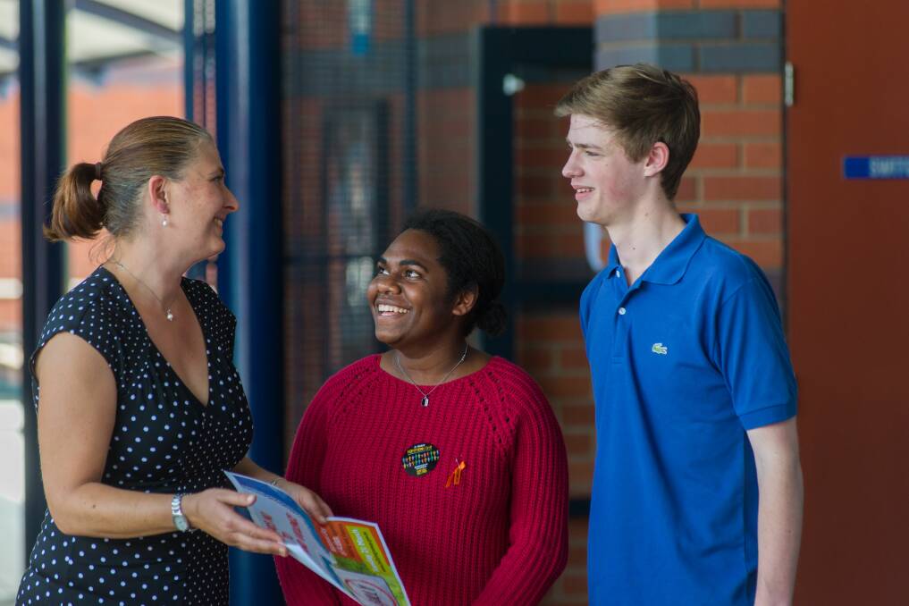 EDUCATION: Legal Aid lawyer Kate Mills with Newstead College Student Leadership Council representatives Nancy Arumbi and Alexander Wood. Picture: Phillip Biggs 