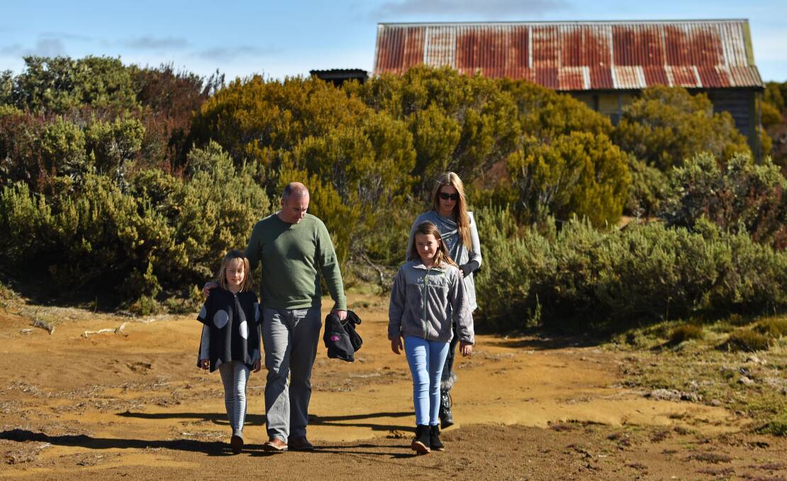 FAMILY FIRST: Adelaide, Marcos, Tabitha and Sonja Ambrose enjoy the alpine air near the Central Highlands lodge. 