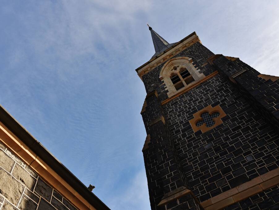 BLUE SKIES: The exterior and spire of the church, which is located at 44 Margaret Street at the corner of Elizabeth Street, from below. 