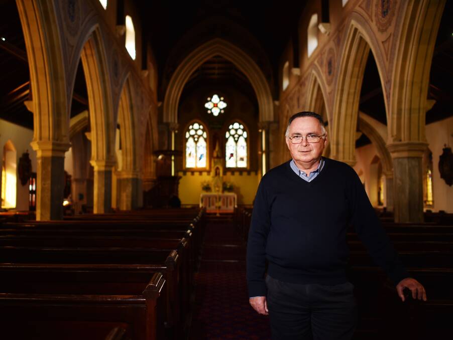 SECOND HOME: Parish Priest of Launceston Father Mark Freeman at the Church of the Apostles, where he has been parish priest since 2010. 