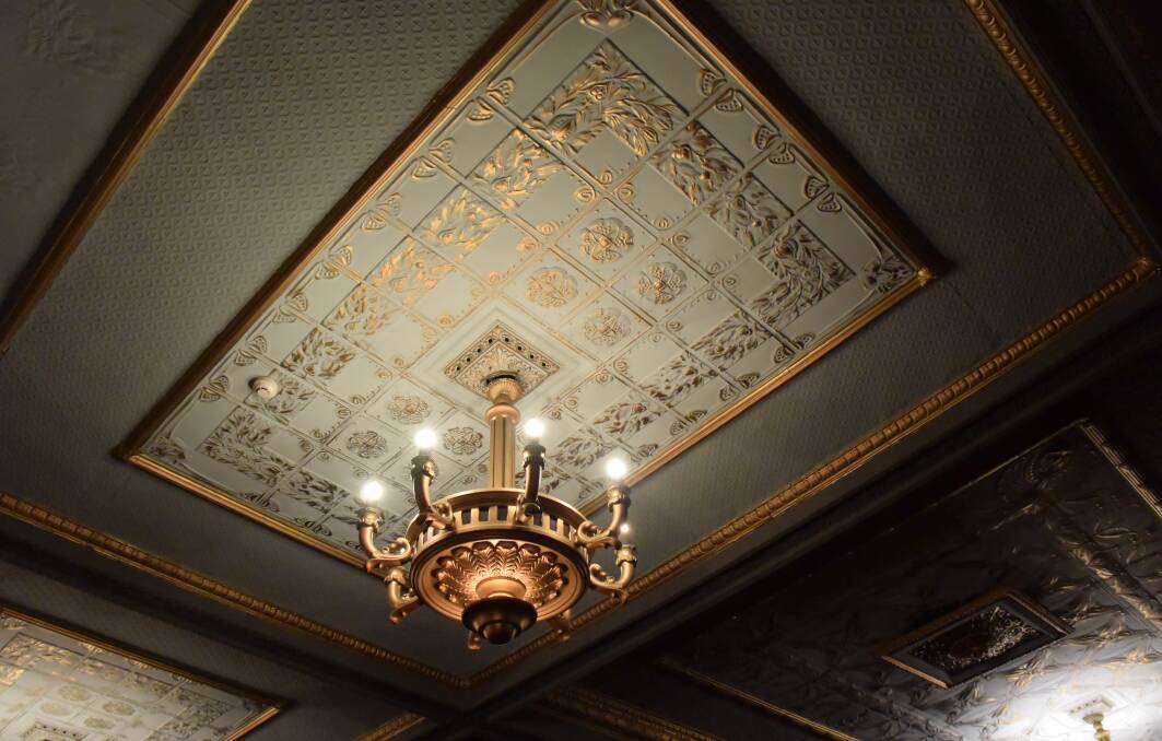 LUMINOUS LIGHTING: An impressive chandelier illuminates the grand Princess Theatre's pressed tin roof. Picture: Tamara McDonald 