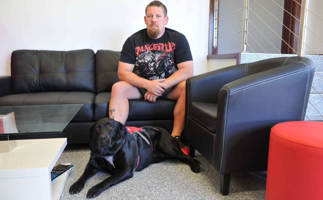 MAN'S BEST FRIEND: Veteran and youth worker Craig Gresham, of Norwood, with his beloved service dog Misha, who inspired him to start Misha's Mates, which aids others training service dogs. Picture: Scott Gelston 