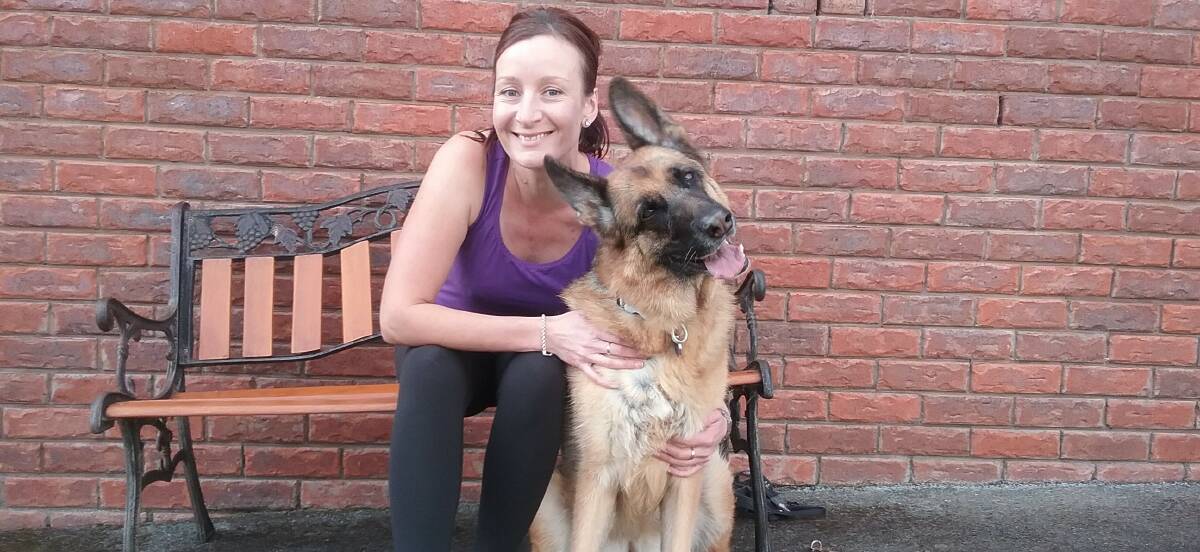 BEST PALS: Angela Bird and her beloved German Shepherd, Jessica, who is nearly 8-years-old. She also has two budgies as pets. 