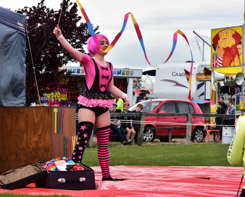 SHINING: Maly Westbrook gives a display of circus arts at the Longford Show. Pictures: Neil Richardson 