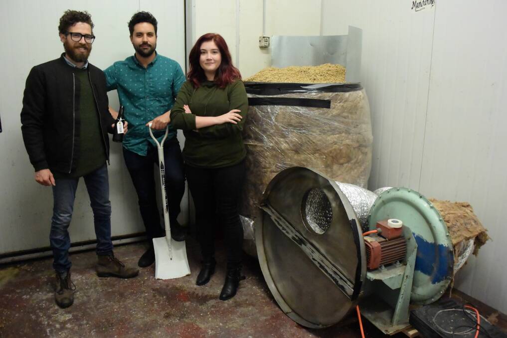 Kick snare founder Andrew Swift, Not for horses founder Bill Armstrong and apprentice Gabbie Clifford, inside the malting kiln. 