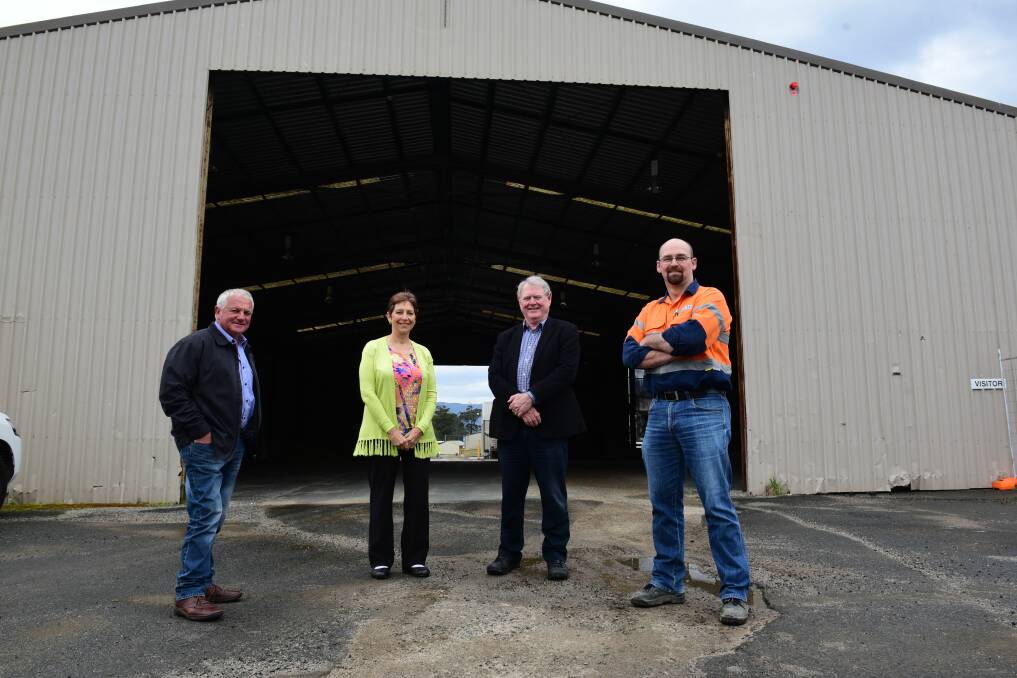 Dorset Renewable Industries' Ken and Karen Hall, David Hamilton and Dale Jessup outside a restored shed.