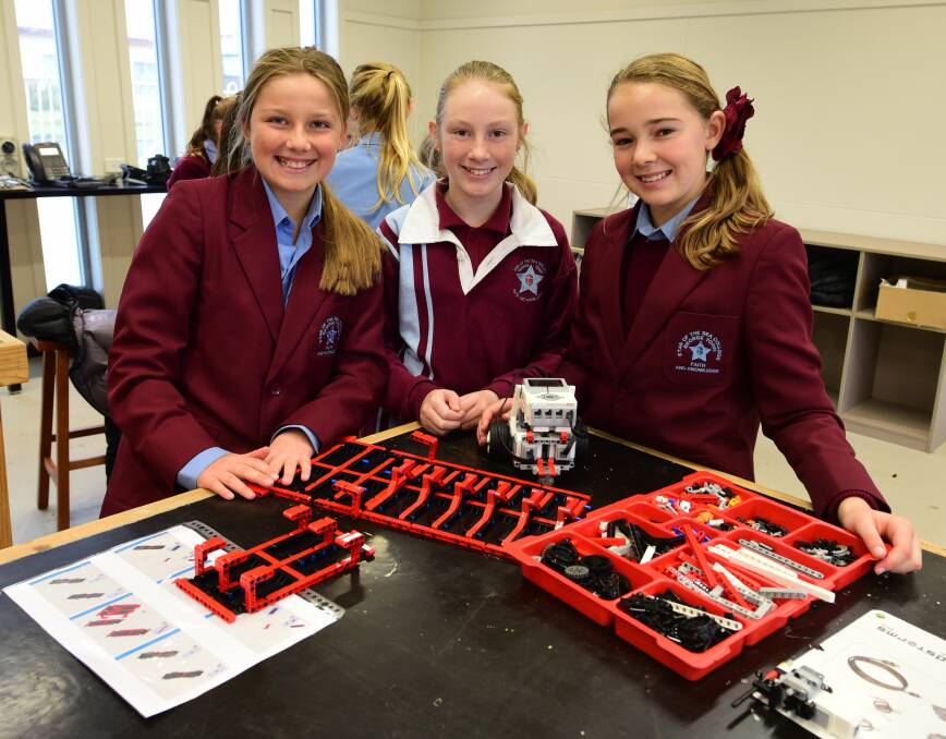LEGO ROBOTS: Grade 6 students Bronte Miller, 11, Belinda Coghill, 11, and Caitlin O'Connor, 12. Picture: Paul Scambler