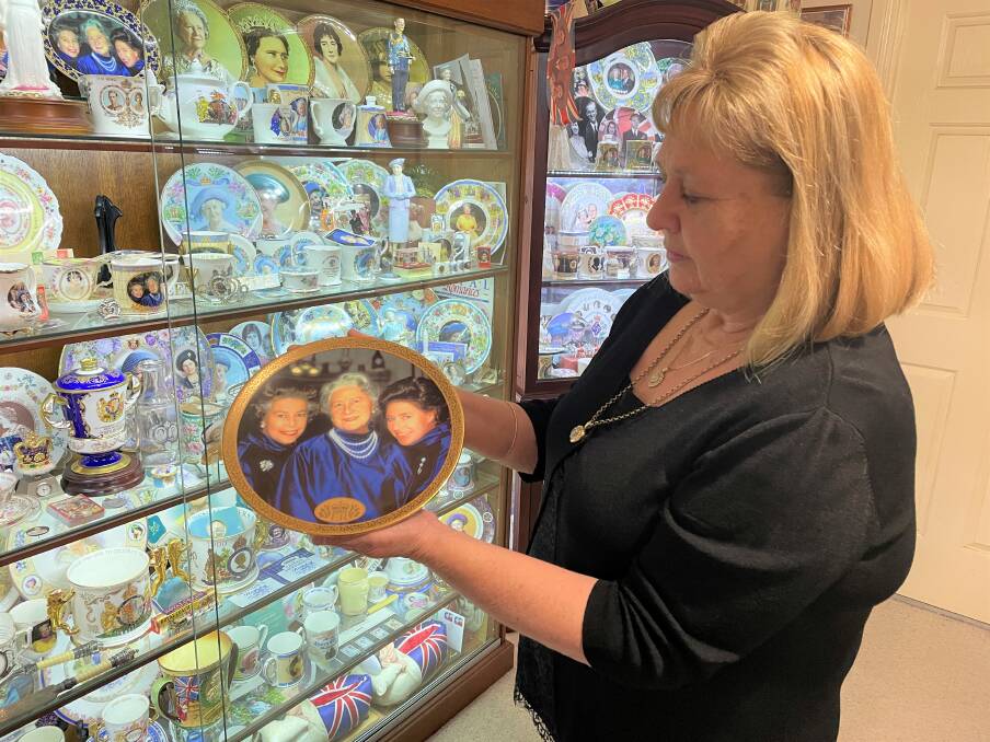 Jan Hugo with her favourite piece of memorabilia featuring Queen Elizabeth II, a commemorative plate that was released after the passing of the Queen Mother in 2002. Picture by Krystal Sellars.