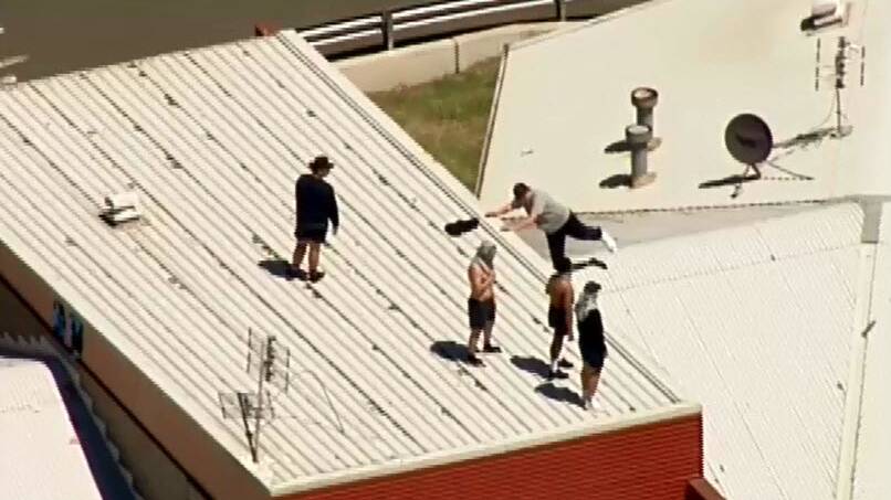 Malmsbury Youth Justice Centre inmates scaled a roof last year. Picture: Channel 9