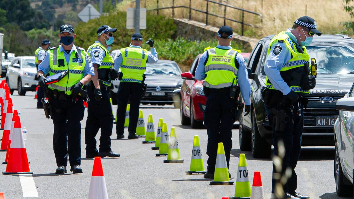 ACT police check cars on the Federal Highway at a Covid checkpoint in January. Picture: Elesa Kurtz
