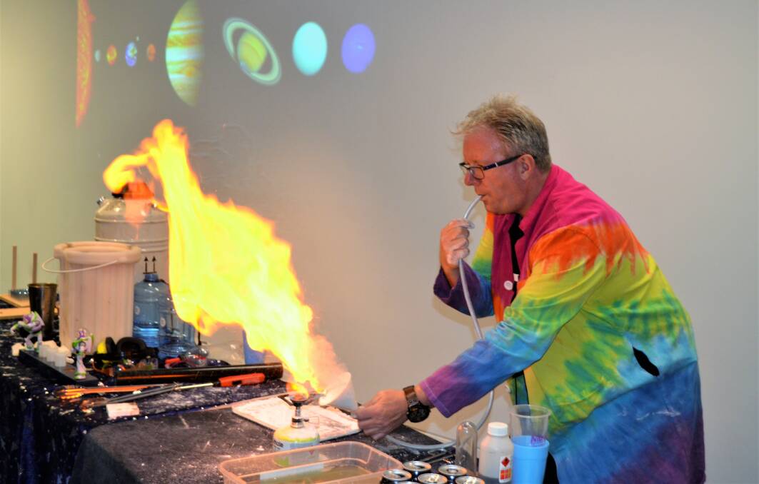 BOOM: The Crazy Scientist practices his fireballs in preparation for his last shows at the Queen Victoria Museum and Art Gallery. Picture: Kasey Wilkins