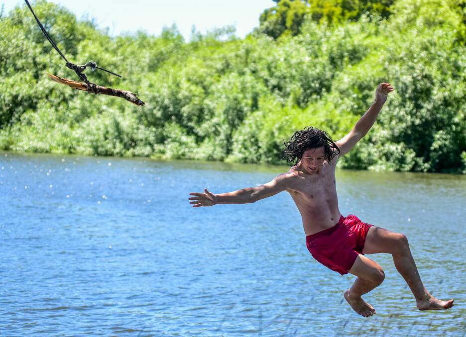 Deacon Osborne cools off at Mill Dam Reserve at Longford. Picture: Neil Richardson