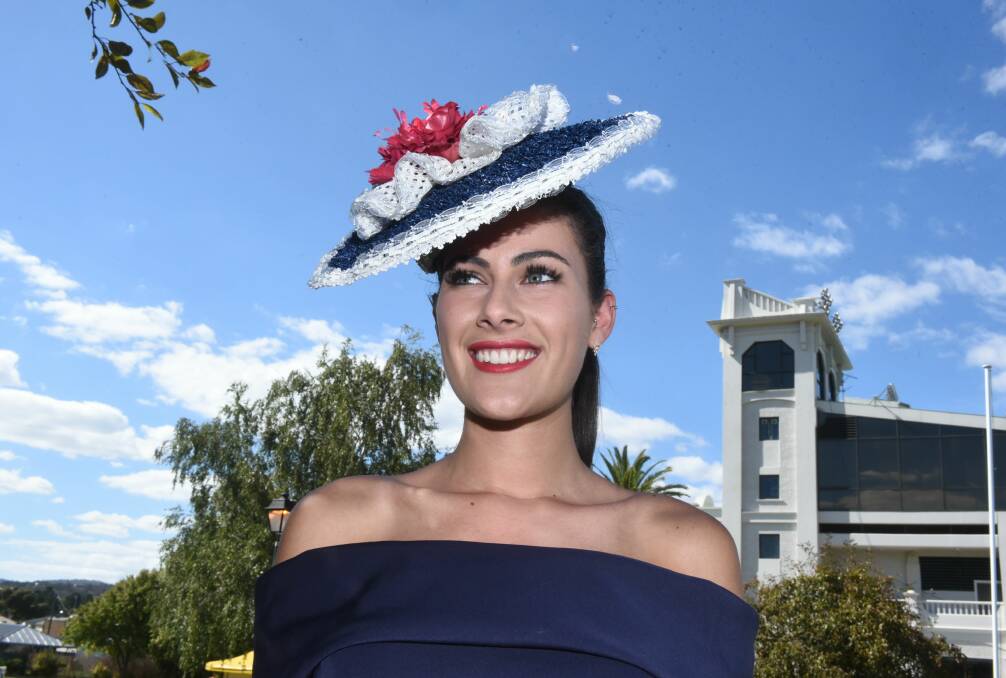 FASHIONABLE: Olivia Willis models some cup fashion, including a long navy dress and hat, at the Tasmanian Turf Club. Picture: Neil Richardson