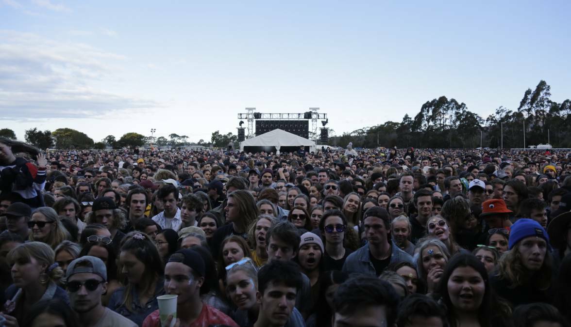 CROWDS: triple j's One Night Stand reached capacity by 5.30pm with about 22,000 punters inside the St Helens Football Ground. Thousands were still outside the gates waiting to get in. Picture: Matt Dennien