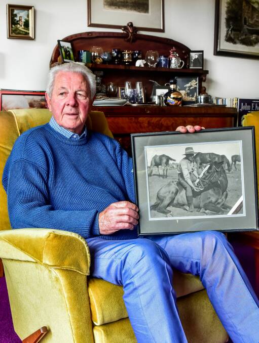 HISTORIC: Don Wing holds a photo of his father, Roy Wing, taken while he was serving in the 3rd Australian Light Horse Regiment during WWI. Picture: Neil Richardson