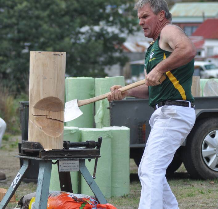 STRENGTH: Axeman Dale Lester gets chopping at a previous Pioneer Woodchopping Carnival. Picture: supplied