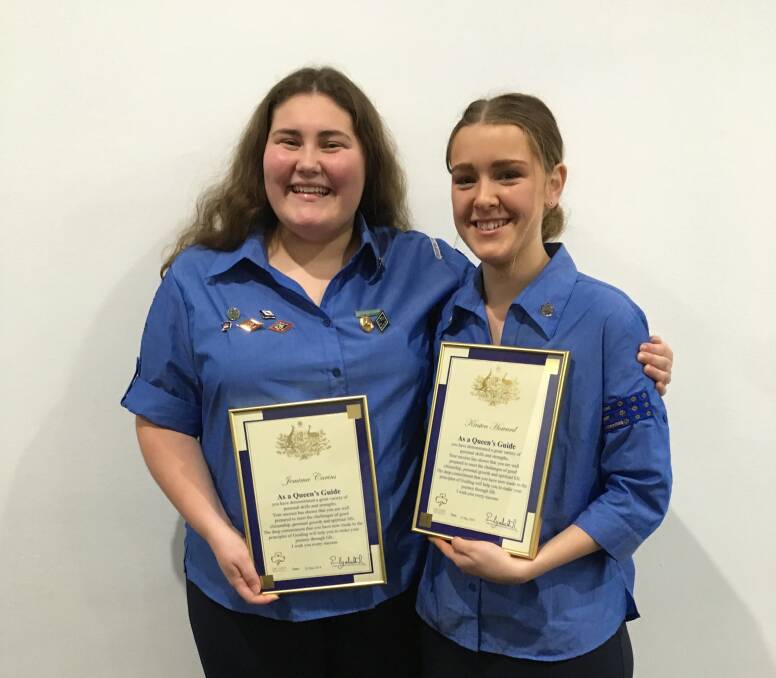PROUD: Girl Guides Jemima Carins and Kirsten Howard were awarded their Queens Guide awards at Government House. Picture: supplied