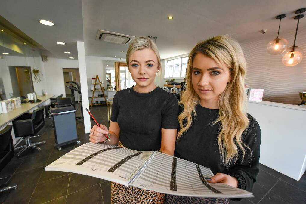 Newstead Hair stylist Caitlin Harback and manager Gabby Gibbons. Picture: Paul Scambler