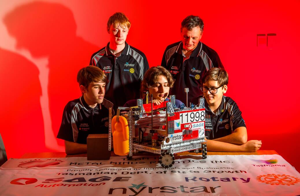 WORLD STAGE: Metal Minds mentors Harry and Jon Heathcote and team members Hayden Walmsley, Oscar Kinman and Malachi Capela just returned from the First Tech Challenge world championships. Picture: Scott Gelston