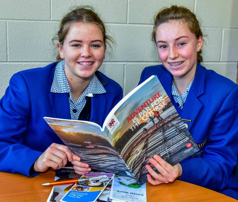 INTO THE FUTURE: Grade 10 pupils Naomi Edwards and Neve Ringk from Exeter High School check out UTAS courses. Picture: Neil Richardson