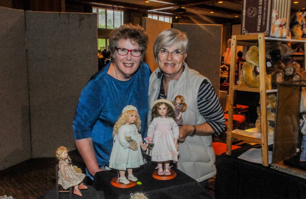 INTRICATE: Stallholders Lesley Moore and Val Ellick show off handmade porcelain dolls at Saturday's fair. Picture: Neil Richardson.