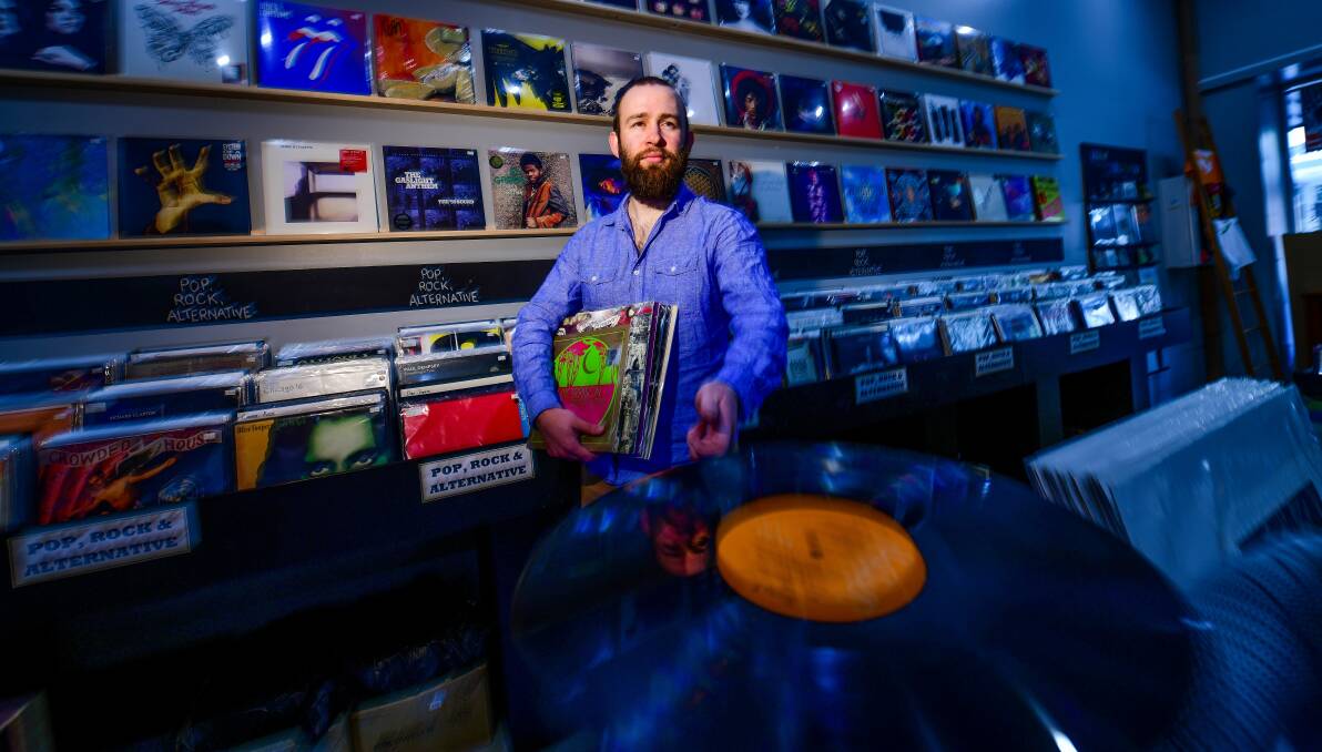 SPINNING: Avenue Records owner Callum Nobes is ready to watch the vinyl fly out the door on Record Store Day. Picture: Scott Gelston