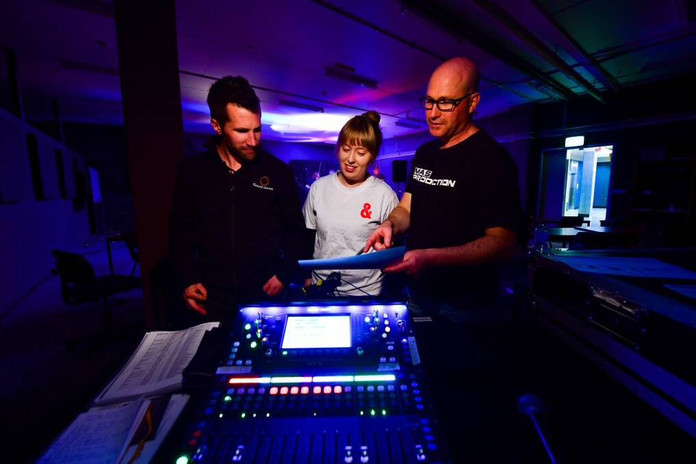 LIGHTS AND MUSIC: Sound House's Simon Widdowson, event organiser Amy King, and TasTAFE teacher Cameron Johnson getting ready for the student-led fundraiser on September 27. Picture: Scott Gelston