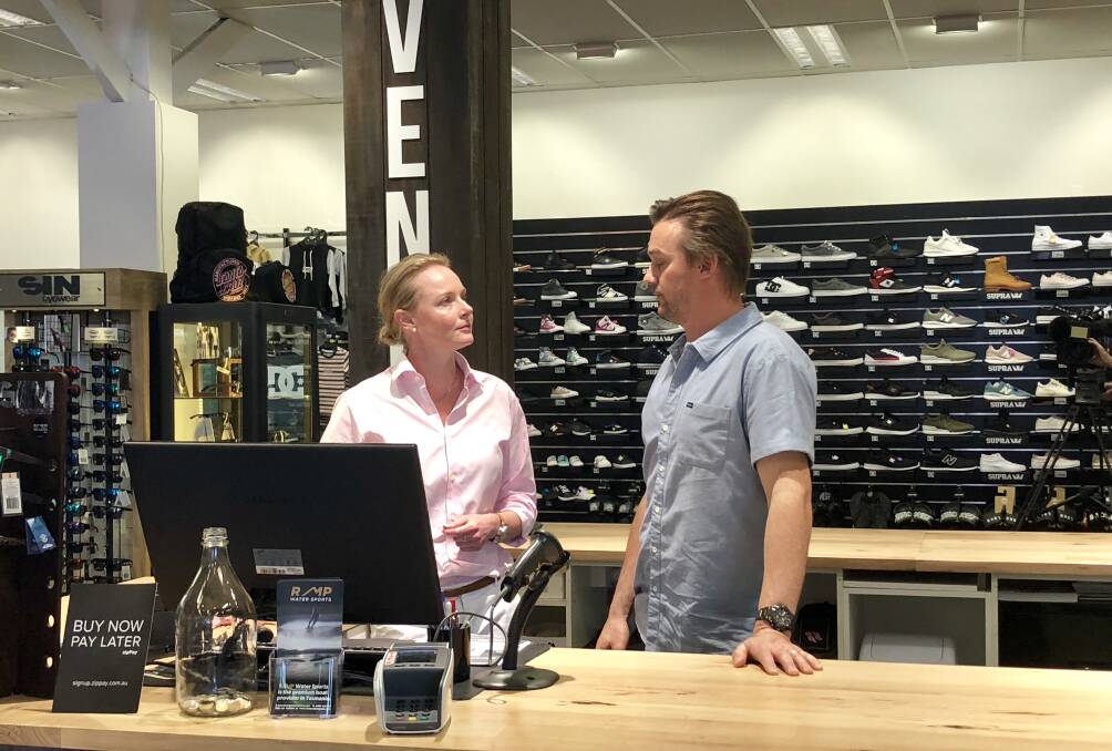 Building and Construction Minister Sarah Courtney and Venue Clothing owner Luke Dawson. Picture: Kasey Wilkins