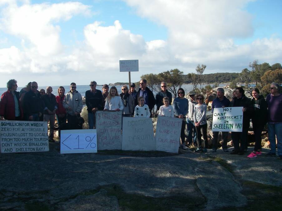 NO WRECK IN SKELETON BAY: Protesters against the scuttling of HMAS Darwin on the state's East Coast gathered at Binalong Bay to share their views on the environmental impacts the ship could have. Picture: supplied