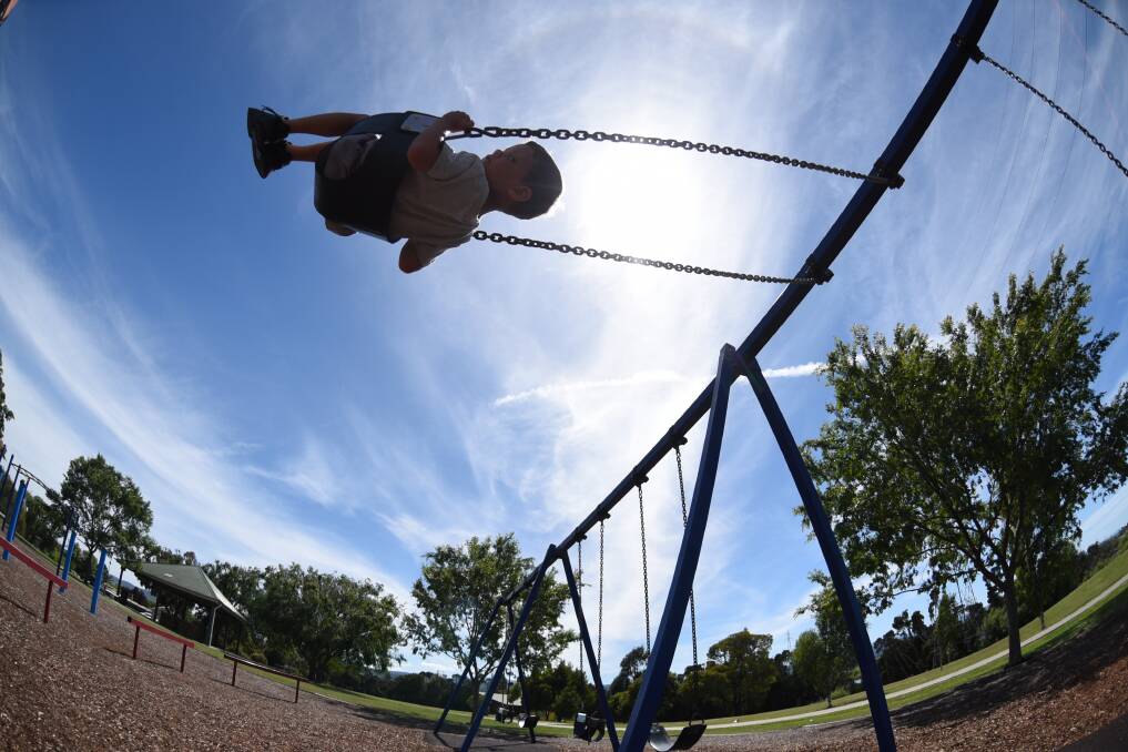 PLAY TIME: Four-year-old Chaise Clarke, of Launceston, is enjoying time on the swings in the warm weather at Tailrace Park. Picture: Paul Scambler