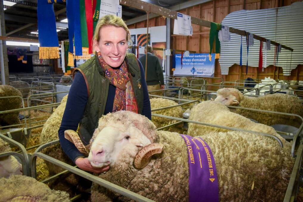 BEST OF THE BEST: Georgina Wallace of the Trefusis Merino Stud at Ross, with the Supreme Fine Wool champion ram named Bruce at the Campbell Town Show. Picture: Paul Scambler