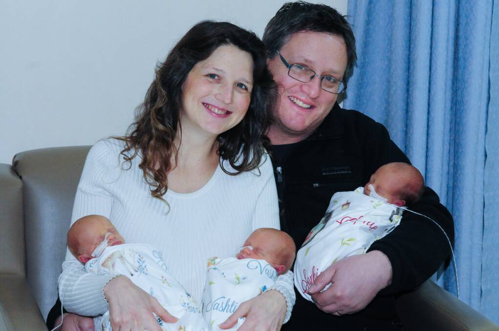 TRIO: Bethany and Jonathon McKay with their girls Evolet Anjalina May, Vashti Alya Rose and Sophie Liesel Grace at the Launceston General Hospital. Picture: Neil Richardson