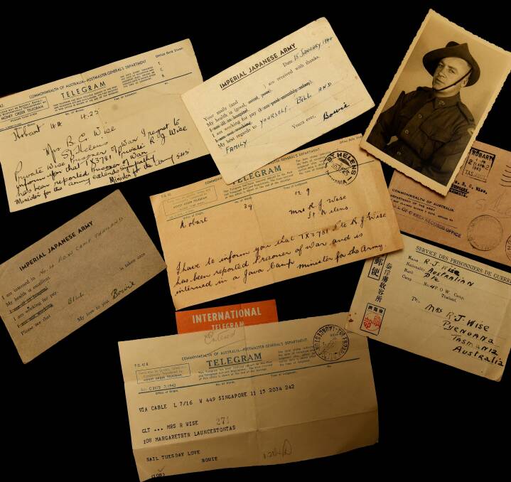 PRECIOUS: Prisoner of war telegrams and photos, as well as newspaper clippings, will join an historical collection of the 12/40th Battalion in Hobart soon. They will be on display after they arrive. Picture: Scott Gelston.