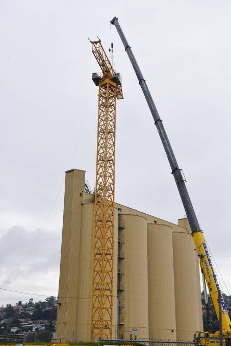 Building crane is assembled on site