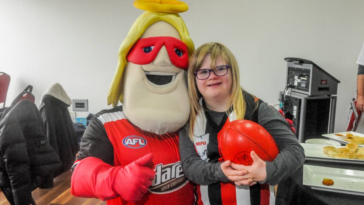 A day at the footy for Down Syndrome children