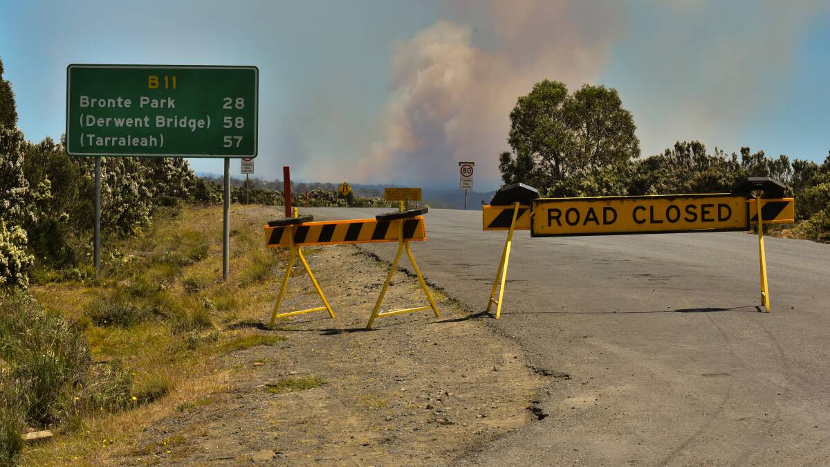 A selection of images of Miena the day an evacuation order was issued as bush fire approches