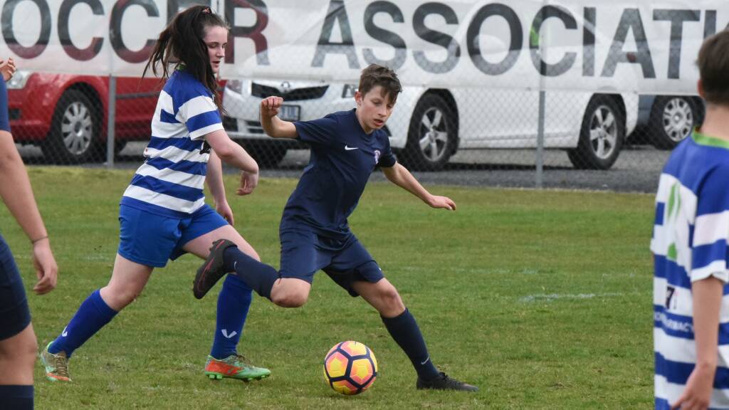 Junior soccer players from around the state compete in Launceston