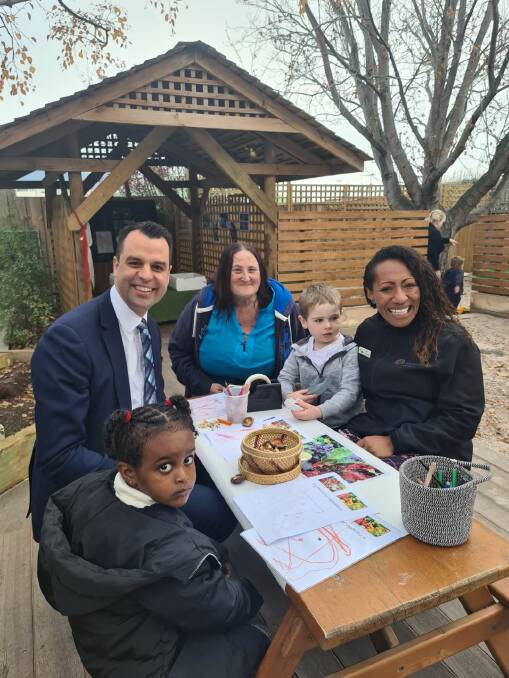 Labor education spokesman Josh Willie and supporters of an early learning program for three-year-olds.