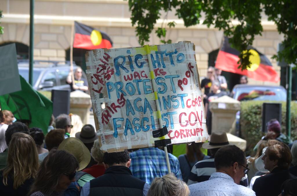 RALLY: Hundreds of people gathered on Parliament House lawns in Hobart to protest against the government's legislation which would provide harsher penalties for protesters who disrupt workplaces. Picture: Matt Maloney