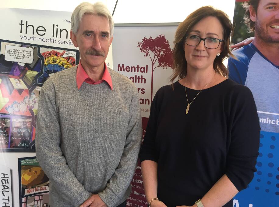 Mental health carer Malcolm Hales of East Launceston and Mental Health Council of Tasmania chief executive Connie Digolis.
