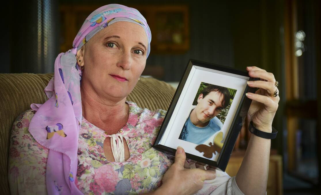 Lisa Bird with a photograph of her son Joshua Gough, who died in a car crash in 2008. Picture: Paul Scambler